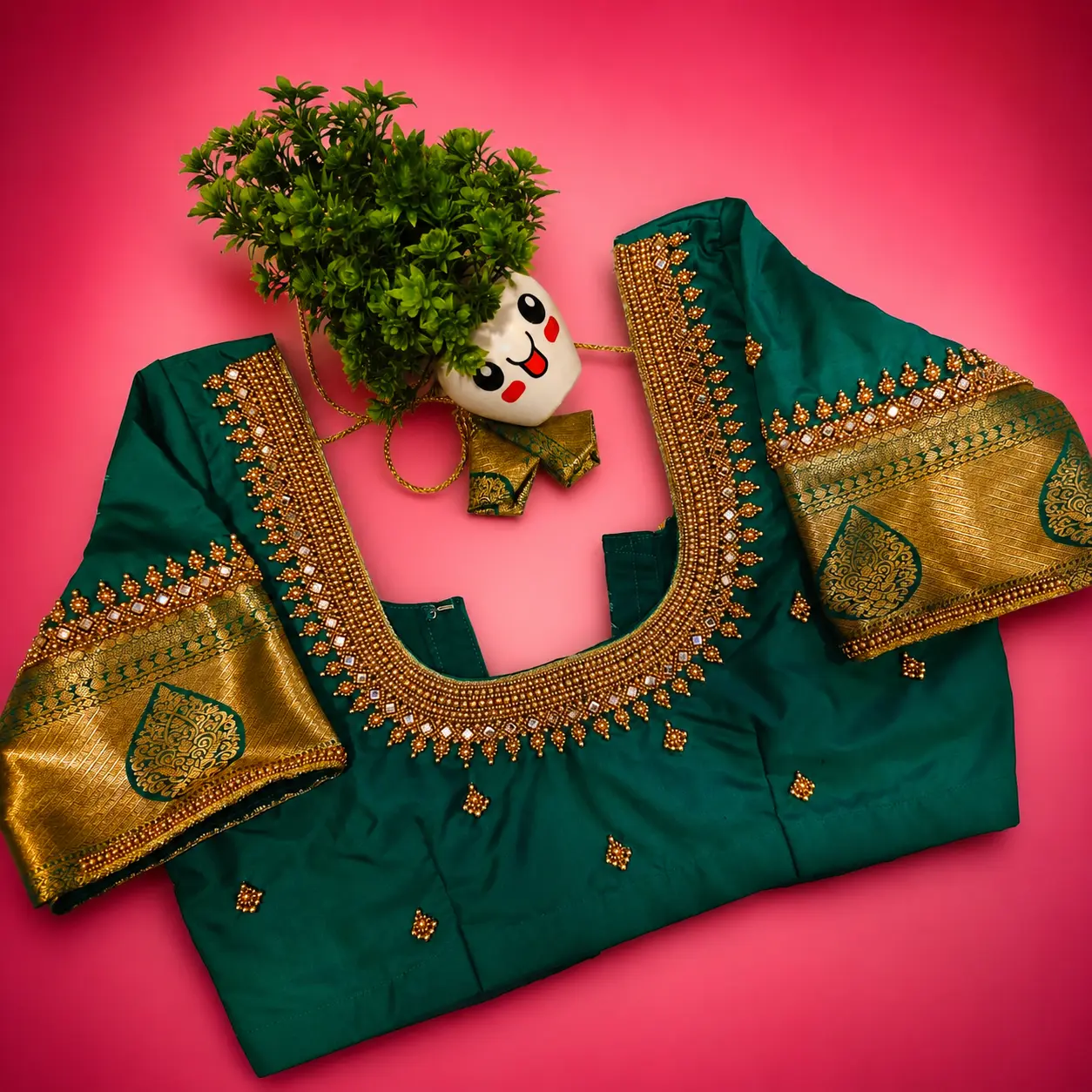 Elegant custom Aari work blouse with stone embroidery