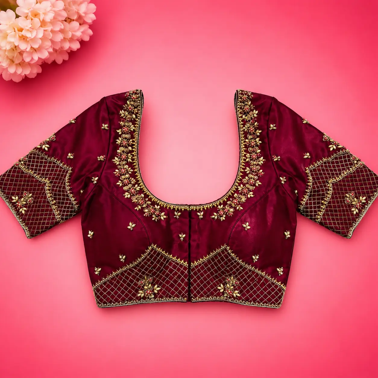 Designer silk blouse featuring premium hand embroidery